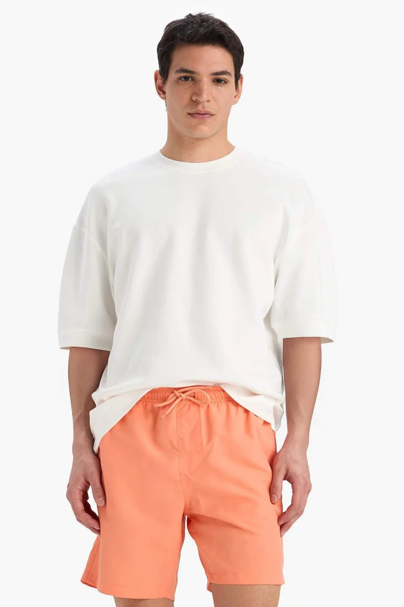 Defacto  Regular Fit Mesh Lined Lightweight Fabric Swim Shorts for Men | Best Price UAE