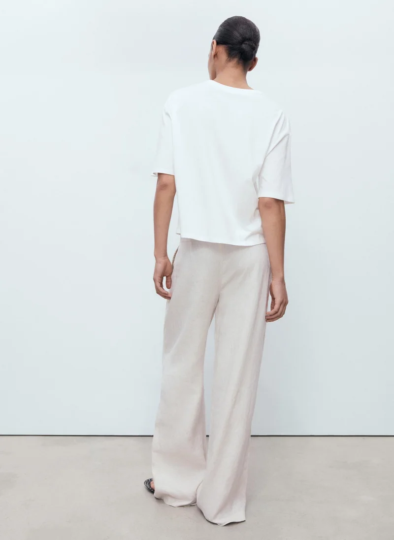 MANGO Cotton t-shirt with flower detail