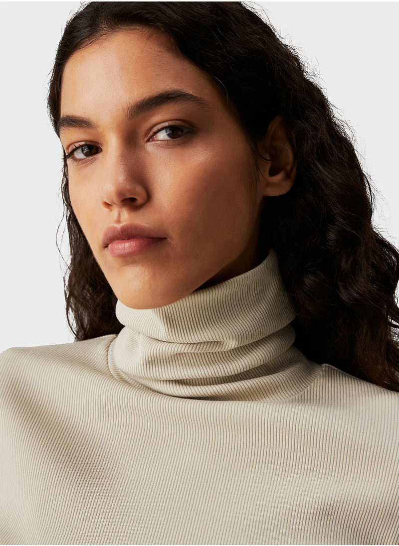 كالفن كلاين جينز Woven Label Rib Rollneck
