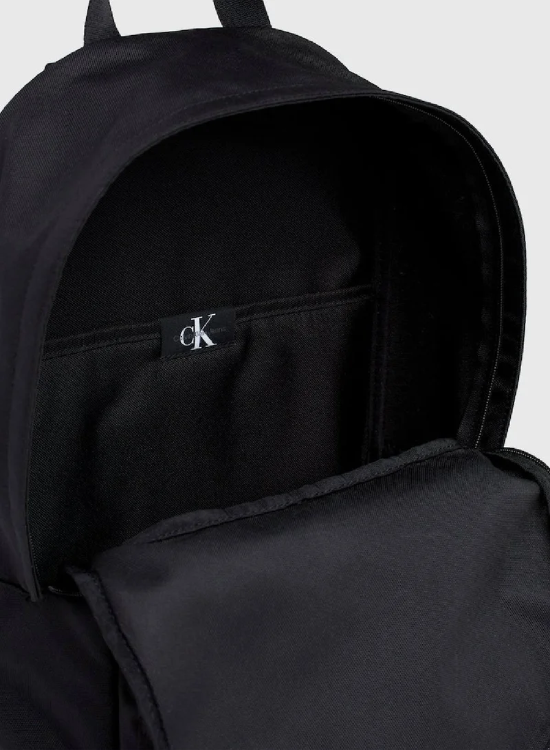 Calvin Klein Jeans Men's Logo Round Backpack -  durable recycled polyester exterior, Black