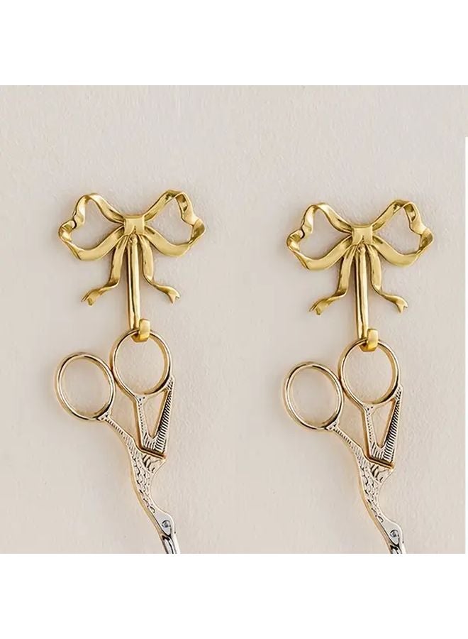Golden 2pcs Metal Bow Tie Wall Hooks Heavy Duty Adhesive Screw Mounted Decor - Image 1