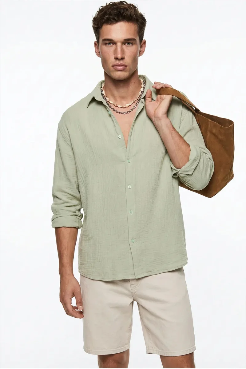 بيانكو لوتشي LUCCI Oversized Textured Button-Front Shirt