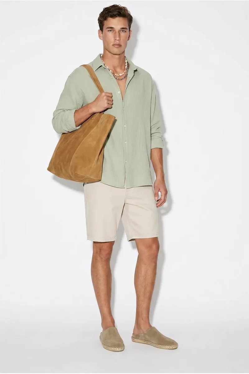 بيانكو لوتشي LUCCI Oversized Textured Button-Front Shirt