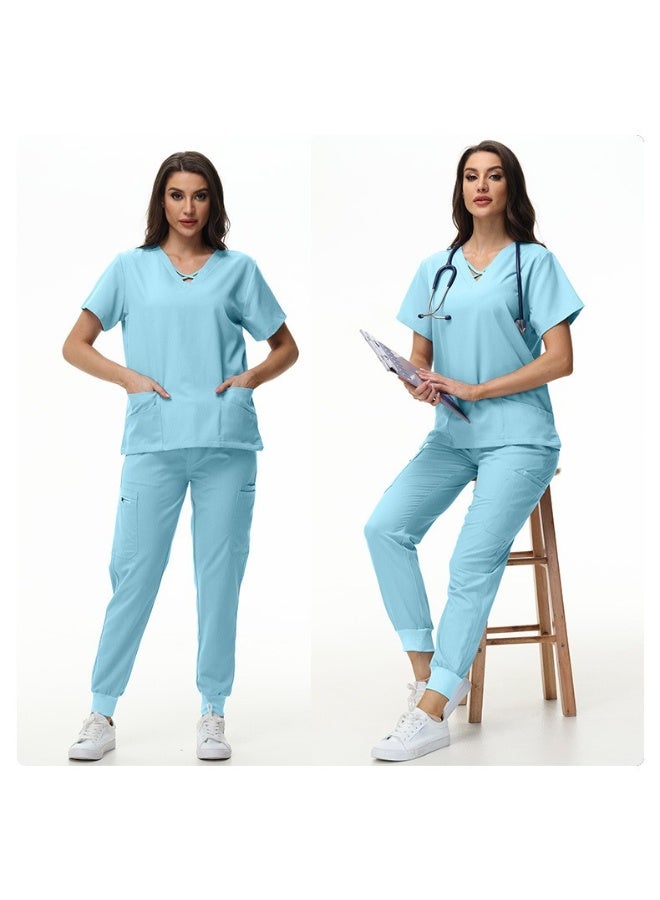 NIBEMINENT طقم جوجر للنساء - زي طبيب مستشفى الحيوانات الأليفة - بدلات جراحية بلون موحد مع جيوب متعددة - ملابس طبيب أسنان على شكل V - Image 2
