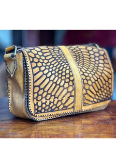 📌 Medium Handmade Genuine Leather Crossbody Bag with Laser Engraving – Art in Every Detail 👜 Size: 22×18 cm – the perfect everyday size 🖋️ Features elegant laser-engraved design for a unique artistic finish 💼 Handcrafted from 100% genuine leather with premium quality 🔒 Includes handle + crossbody strap + 3 compartments + soft velvet lining + magnetic lock  ✔️ Lightweight, stylish, and functional ✔️ Matches casual and formal outfits ✔️ From Holy of Holies Store – where leather meets art  📦 Available now – Delivery across Egypt