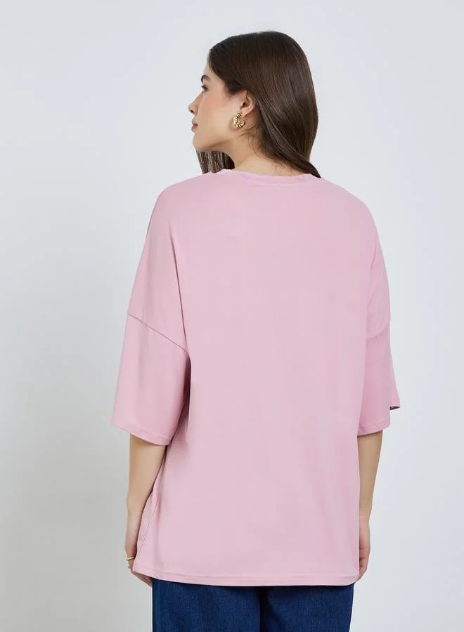 Styli  Pink Oversized Slogan T-Shirt for Women | Best Price UAE