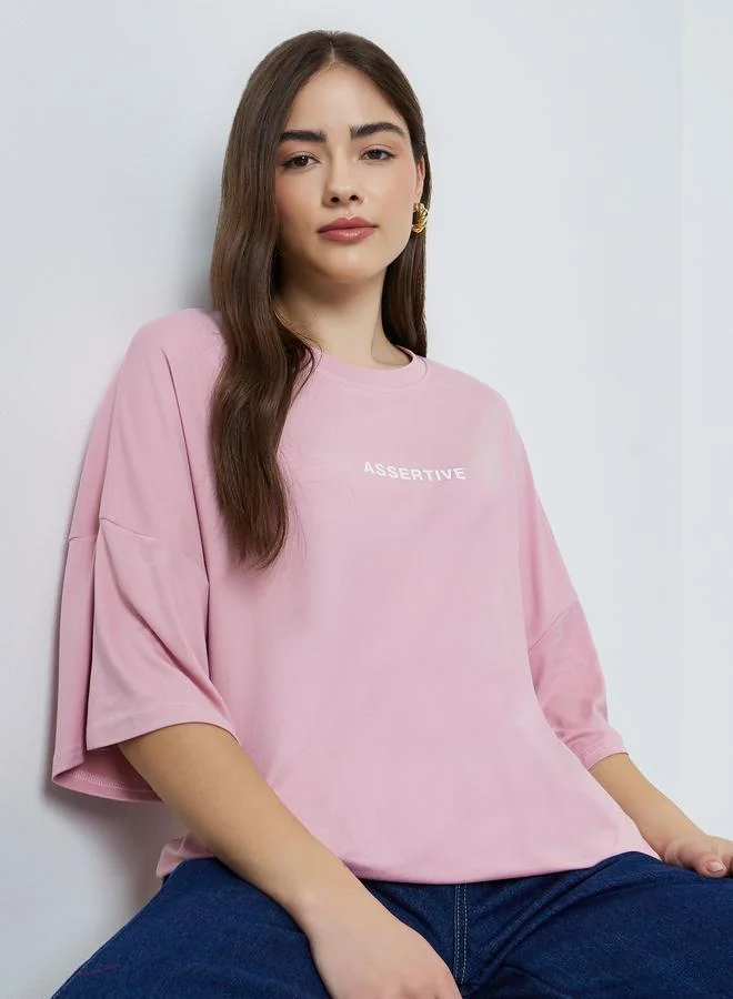 Styli  Pink Oversized Slogan T-Shirt for Women | Best Price UAE