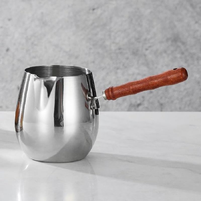 يوج { "titleAr": "إبريق قهوة تركي YOOJ® سعة 20 أونصة/600 مل، مصنوع من فولاذ مقاوم للصدأ من الدرجة الغذائية 304، مع مقبض خشبي مقاوم للحرارة، مناسب لتسخين الحليب والزبدة والشوكولاتة (سعة 420 مل)" "detailsAr": "【فولاذ مقاوم للصدأ من الدرجة ال - Image 2