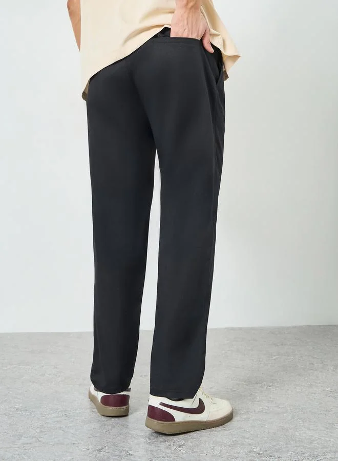 Styli  Men Black Cotton Relaxed Fit Pants for Men | Best Price UAE