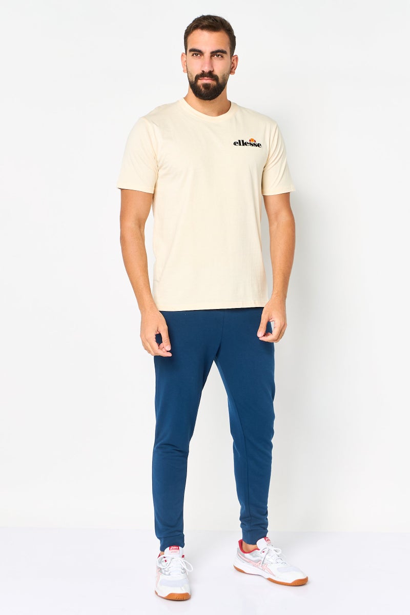 Ellesse تي شيرت رياضي للرجال بأكمام قصيرة مناسب في الهواء الطلق، كريمي - Image 2