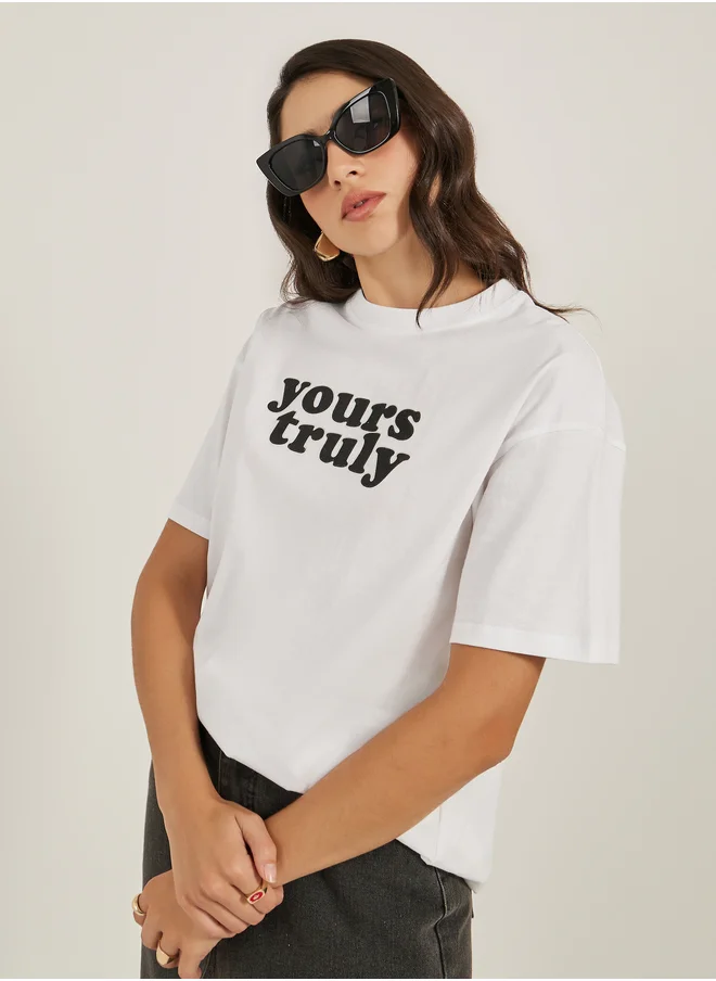 ستايلي Slogan Print Round Neck Oversized T-Shirt