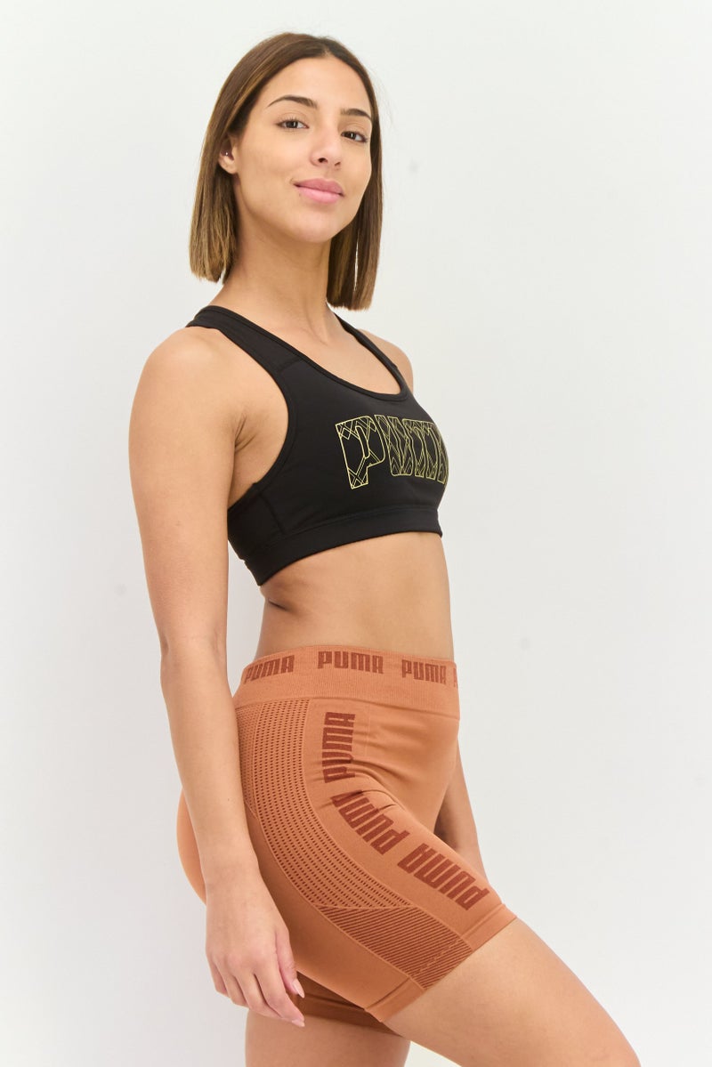 PUMA حمالة صدر رياضية مبطنة بشعار العلامة التجارية للنساء، أسود/ذهبي - Image 4