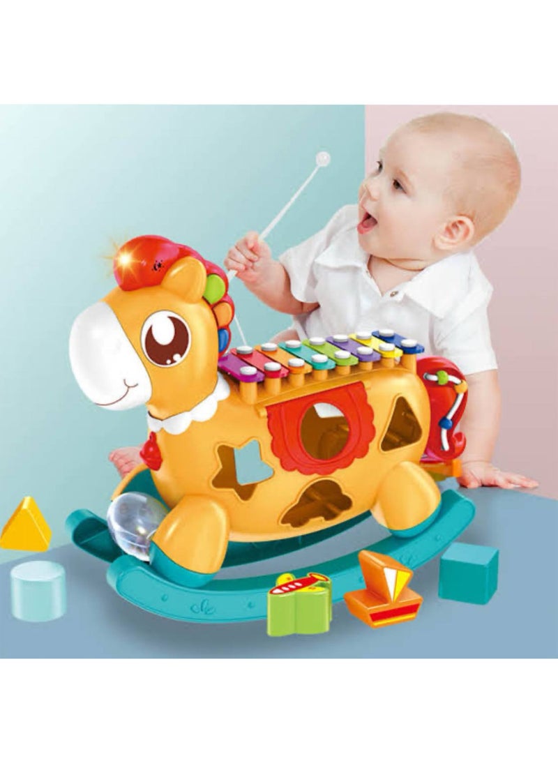 Let your child have fun and learn at the same time with this magical rocking horse!   - Colorful xylophone piano to boost hearing and creativity   - Shape sorting games to improve focus and hand-eye coordination   - Safe rocking horse for movement and balance   - Rotating balls and colorful beads to develop fine motor skills   - Bright, child-safe colors   - Enhances intelligence, sensory skills, and attention span   - Suitable for kids 1 year and up – a perfect gift for boys and girls! - Image 1