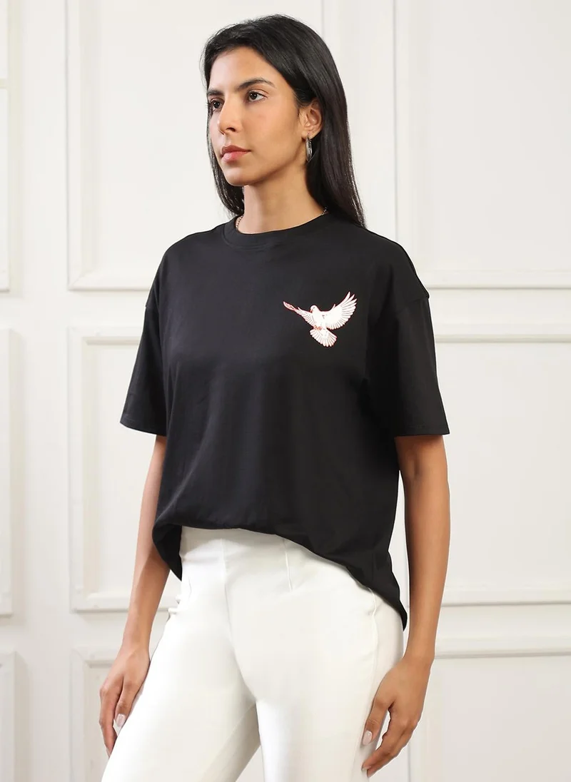 جلو باص Globus Women Black Round Neck Drop Shoulder Sleeves Graphic Back Print Oversized T-Shirt