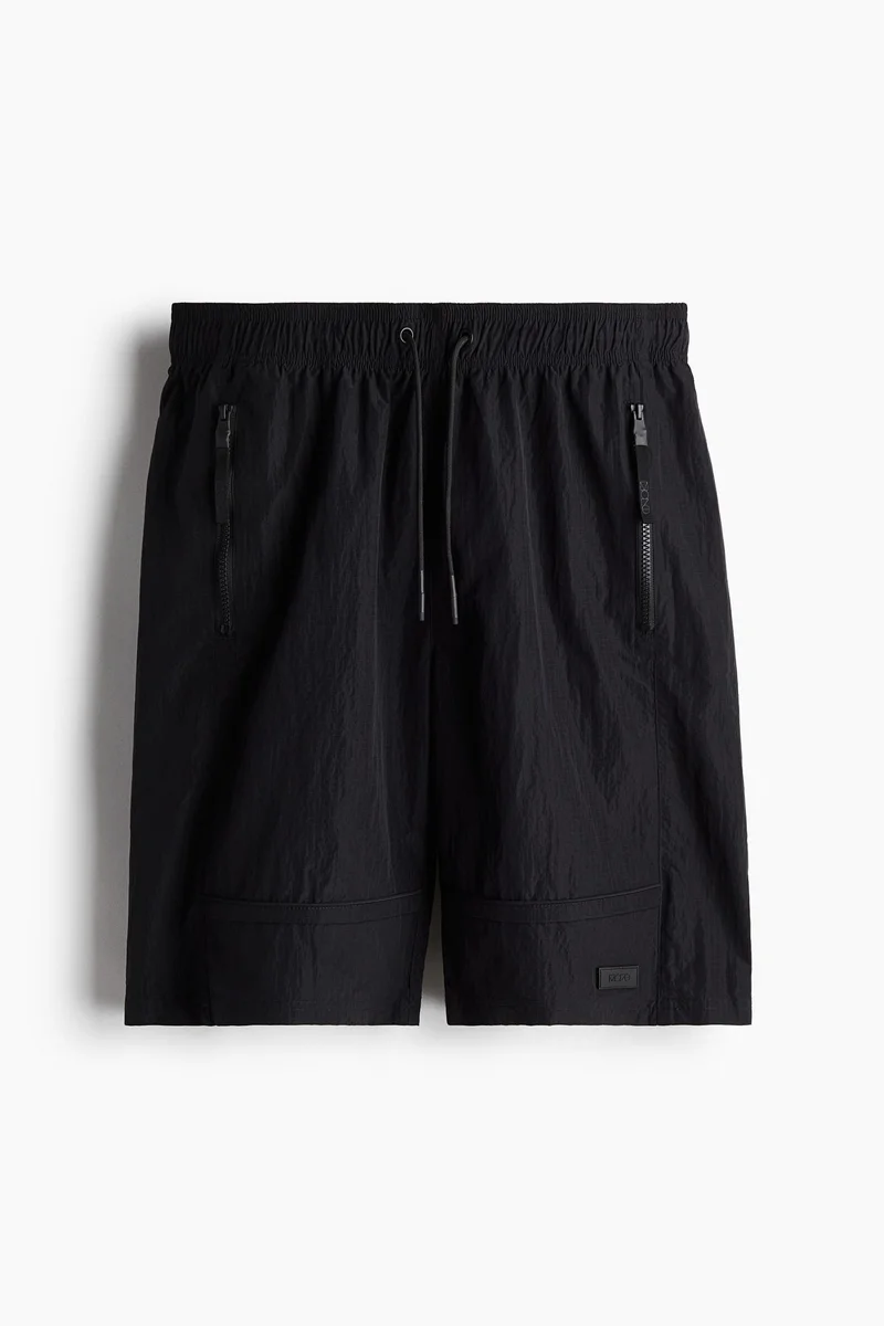 H&M Water-repellent sports shorts