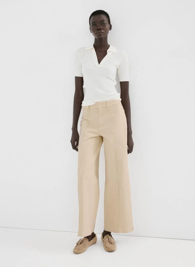 Mango  High-waisted wide leg jeans with stitching for Women | Best Price UAE