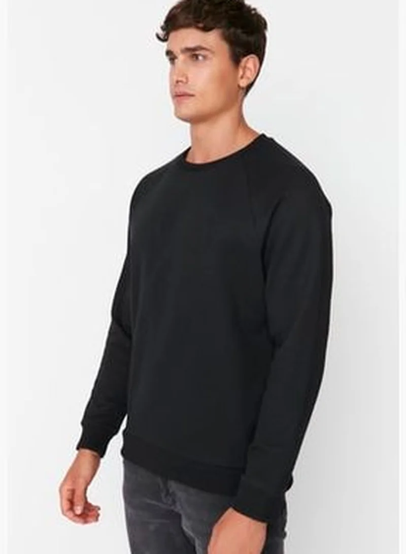 trendyol Black Men's Basic Oversize Fit Crew Neck Raglan Sleeve Sweatshirt.
