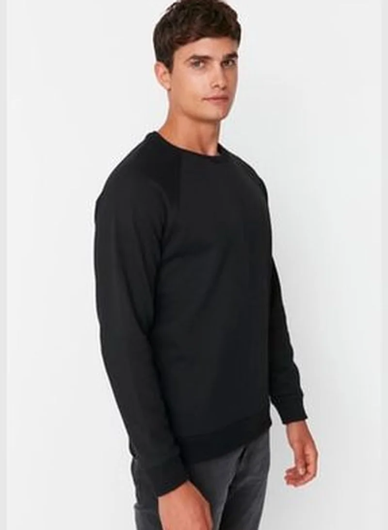trendyol Black Men's Basic Oversize Fit Crew Neck Raglan Sleeve Sweatshirt.