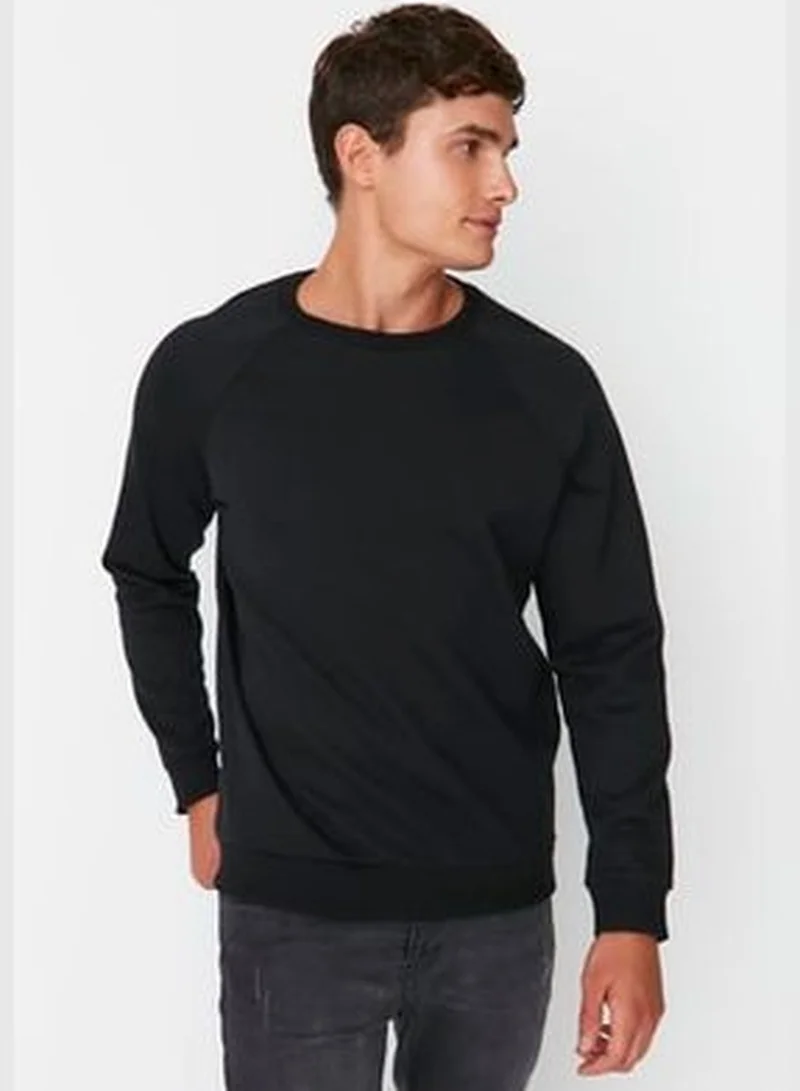 trendyol Black Men's Basic Oversize Fit Crew Neck Raglan Sleeve Sweatshirt.