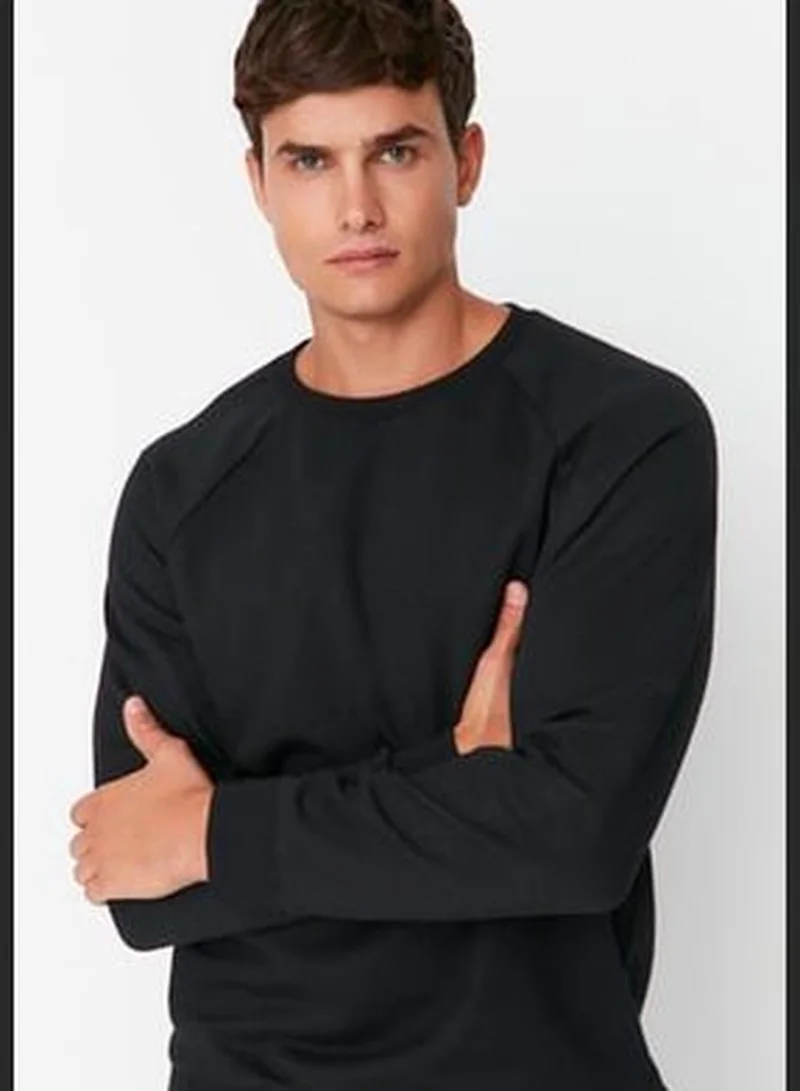 trendyol Black Men's Basic Oversize Fit Crew Neck Raglan Sleeve Sweatshirt.