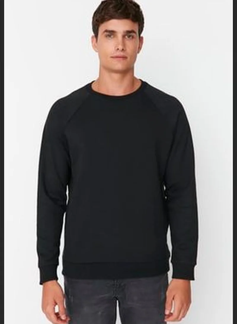 trendyol Black Men's Basic Oversize Fit Crew Neck Raglan Sleeve Sweatshirt.