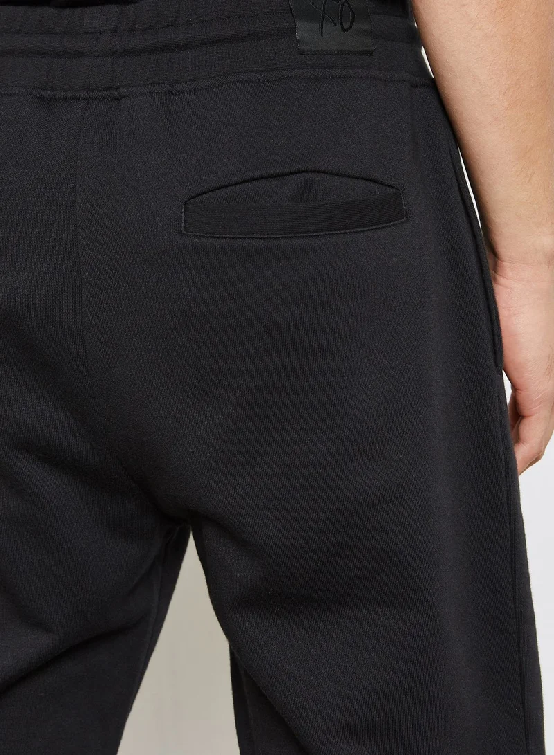 PUMA XO Logo Sweatpants