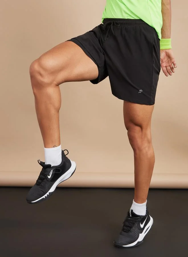 Styli Active black Solid 2In1 Training 7Inch Shorts for Men | Best Price UAE