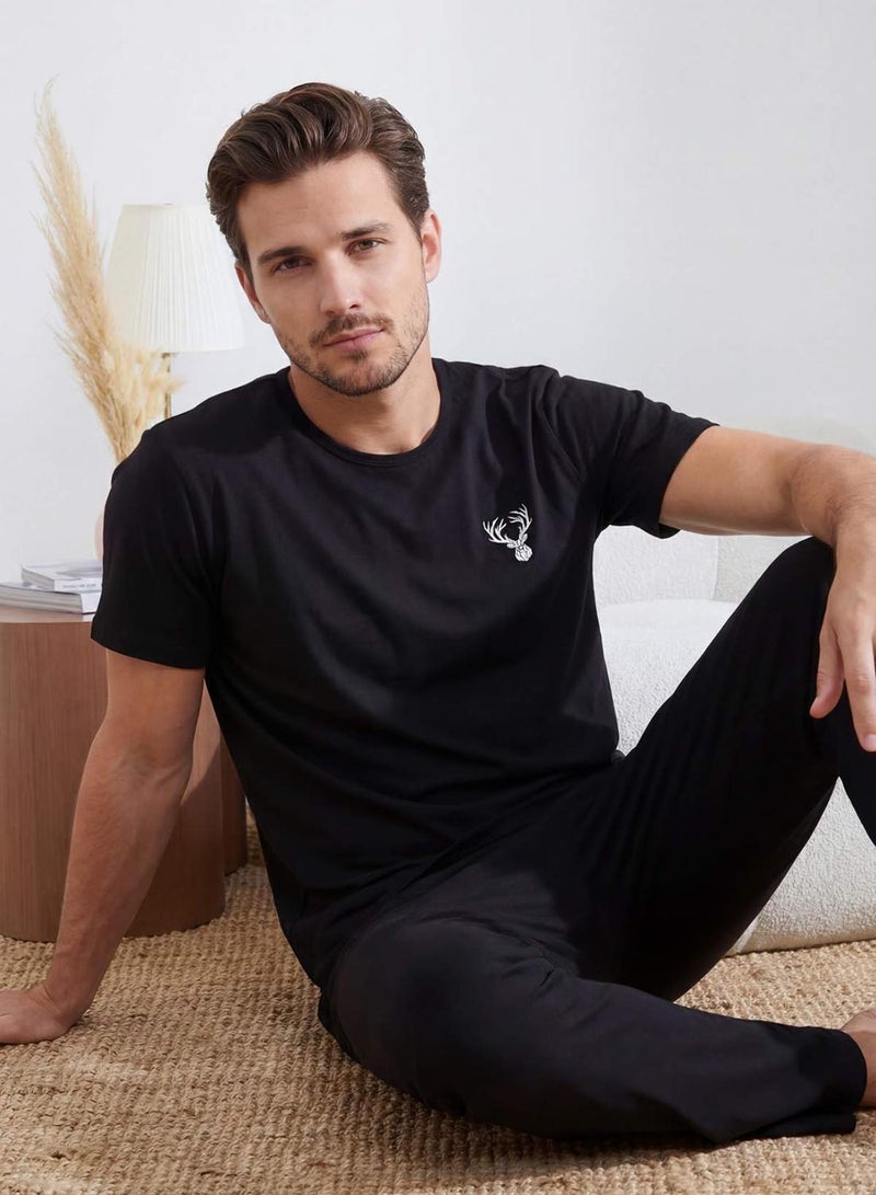 trendyol Black Regular Fit Printed Short Sleeve Knitted Pajamas Set Tmnss25Pt00040 - Image 1