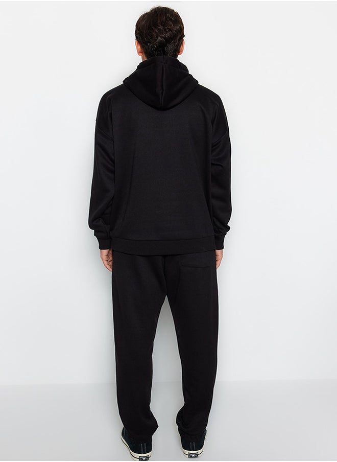 trendyol Black Oversize/Wide Cut Basic Cotton Tracksuit with Elasticized Legs and Fleece Inside TMNAW24EM00002  - Image 4