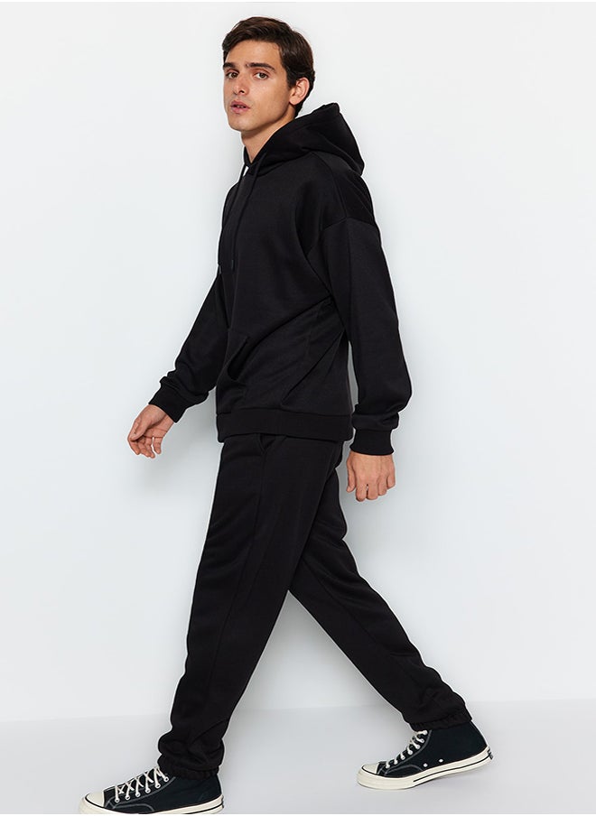 trendyol Black Oversize/Wide Cut Basic Cotton Tracksuit with Elasticized Legs and Fleece Inside TMNAW24EM00002  - Image 3