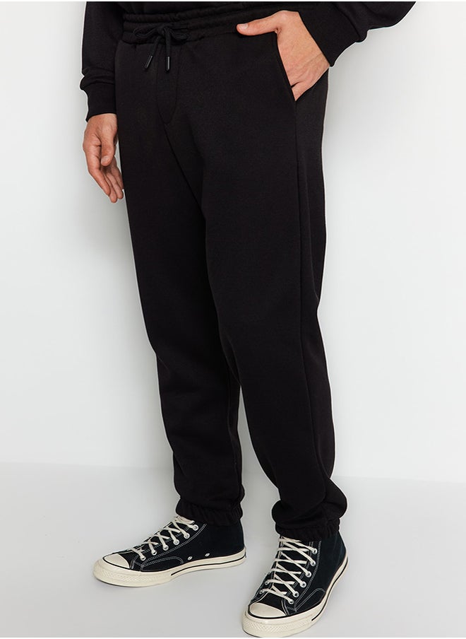 trendyol Black Oversize/Wide Cut Basic Cotton Tracksuit with Elasticized Legs and Fleece Inside TMNAW24EM00002  - Image 5