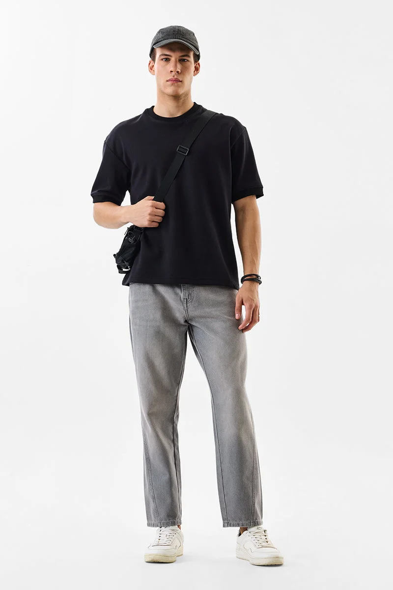 SNITCH جينز واسع مغسول