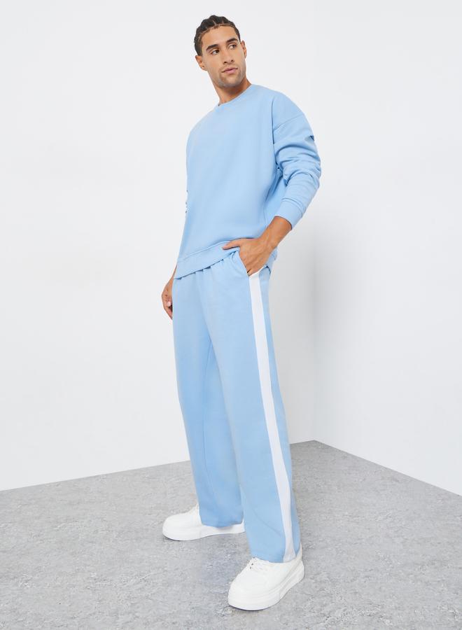 ستايلي طقم منسق من جوغر وسويت شيرت واسع - Image 2