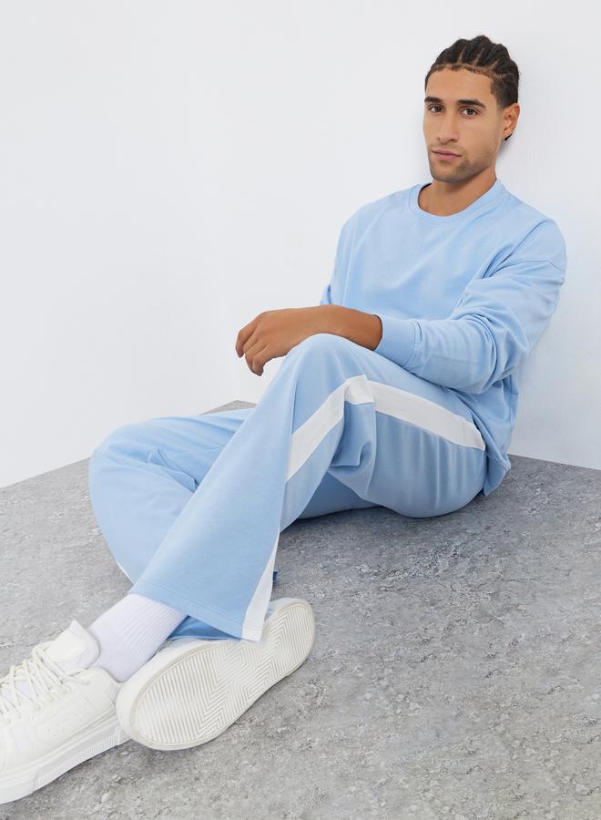 ستايلي طقم منسق من جوغر وسويت شيرت واسع - Image 1