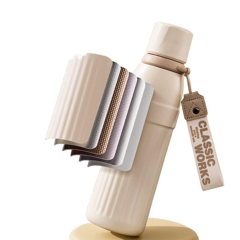 AD قارورة مياه للأطفال بغطاء بشفاط ومقبض سهل الحمل من ستانلس ستيل باللون الأبيض - 600 ml مع غطاء بقشة مع مقبض من الستانلس ستيل - Image 4