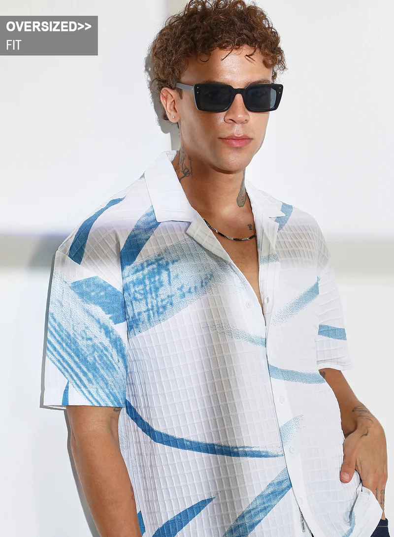 Campus Sutra Campus Sutra Men's Sky Blue & Chalk White Stroked Waffle Oversized Shirt For Casual Wear | Cuban Collar | Short Sleeve | Button Closure | Oversized Shirt Crafted With Comfort Fit For Everyday Wear