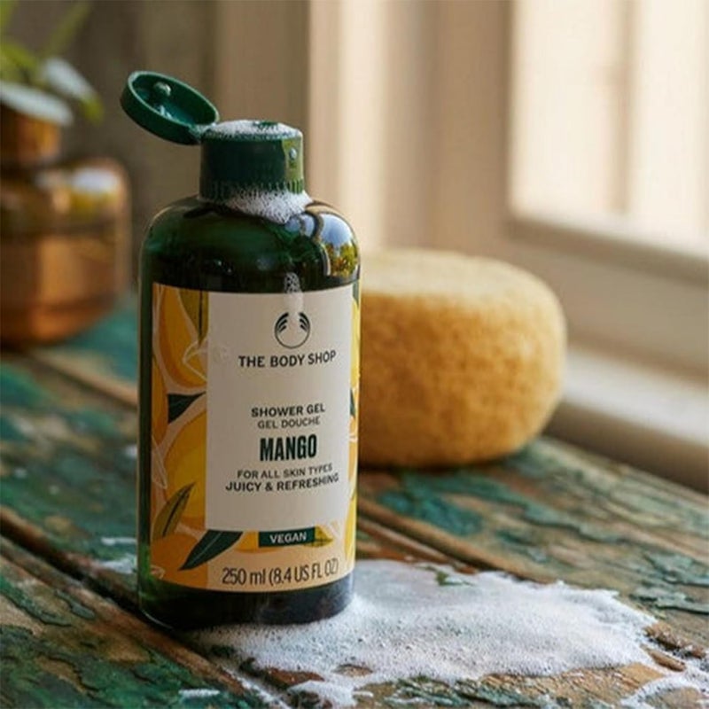 THE BODY SHOP جل استحمام مانجو – منظف رغوي ومنعش لجميع أنواع البشرة | مانجو عصير وفاكهة العاطفة، 250 مل - Image 3