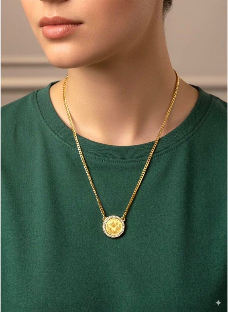 An elegant and sophisticated necklace that combines a timeless design with the radiance of luxury. Its center features a prominent circular pendant engraved with a historic coin, surrounded by a sparkling halo of dazzling zircon stones that add a captivating shine. The necklace is connected to a sturdy gold chain with classic links, giving it a complete look that blends authenticity and modernity, making it suitable for a variety of elegant looks and occasions. - Image 1