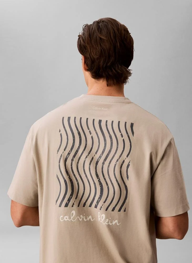 Calvin Klein Jeans Plaza Taupe Line Logo Graphic Relaxed T‑Shirt for Men | Best Price UAE
