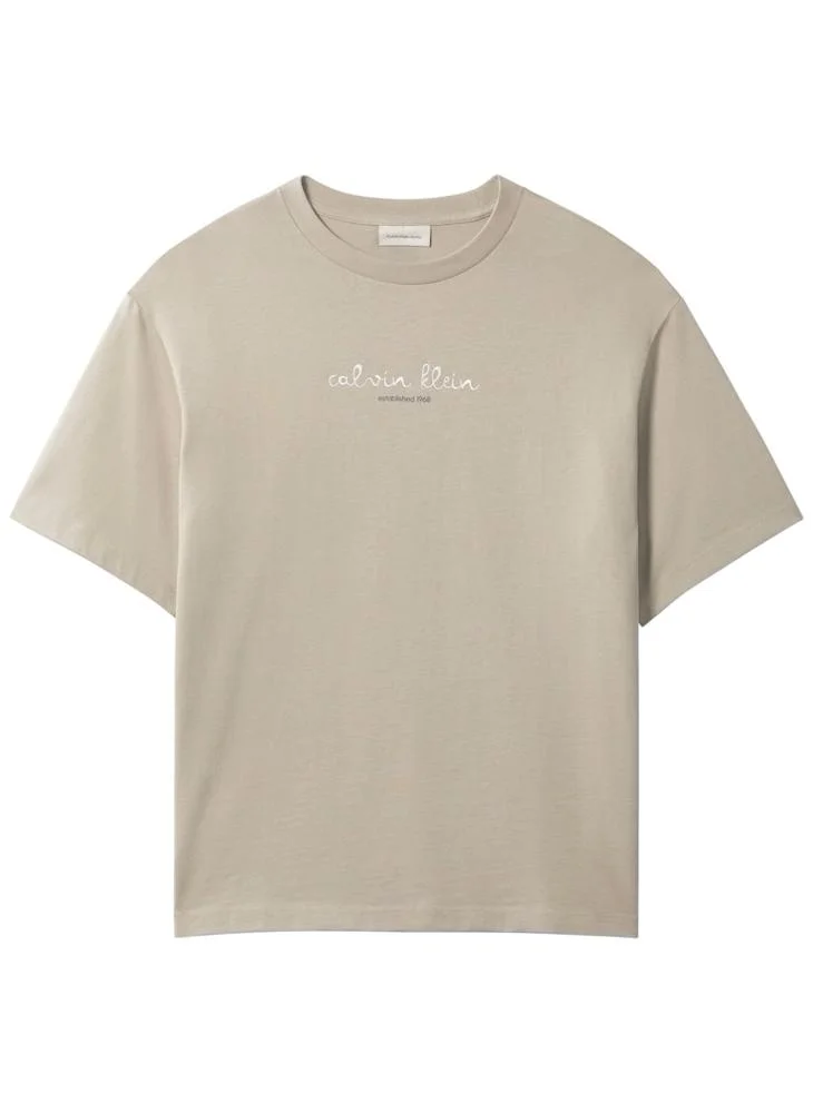 Calvin Klein Jeans Plaza Taupe Line Logo Graphic Relaxed T‑Shirt for Men | Best Price UAE