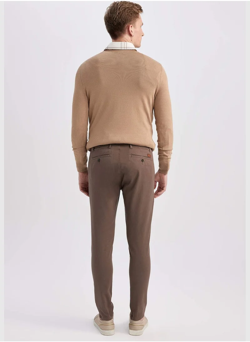 ديفاكتو Man Carrot Fit Chino Trousers