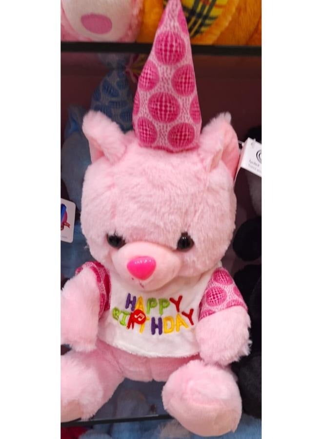 دمية دب وردي مع قبعة الحفلة وعيد الميلاد