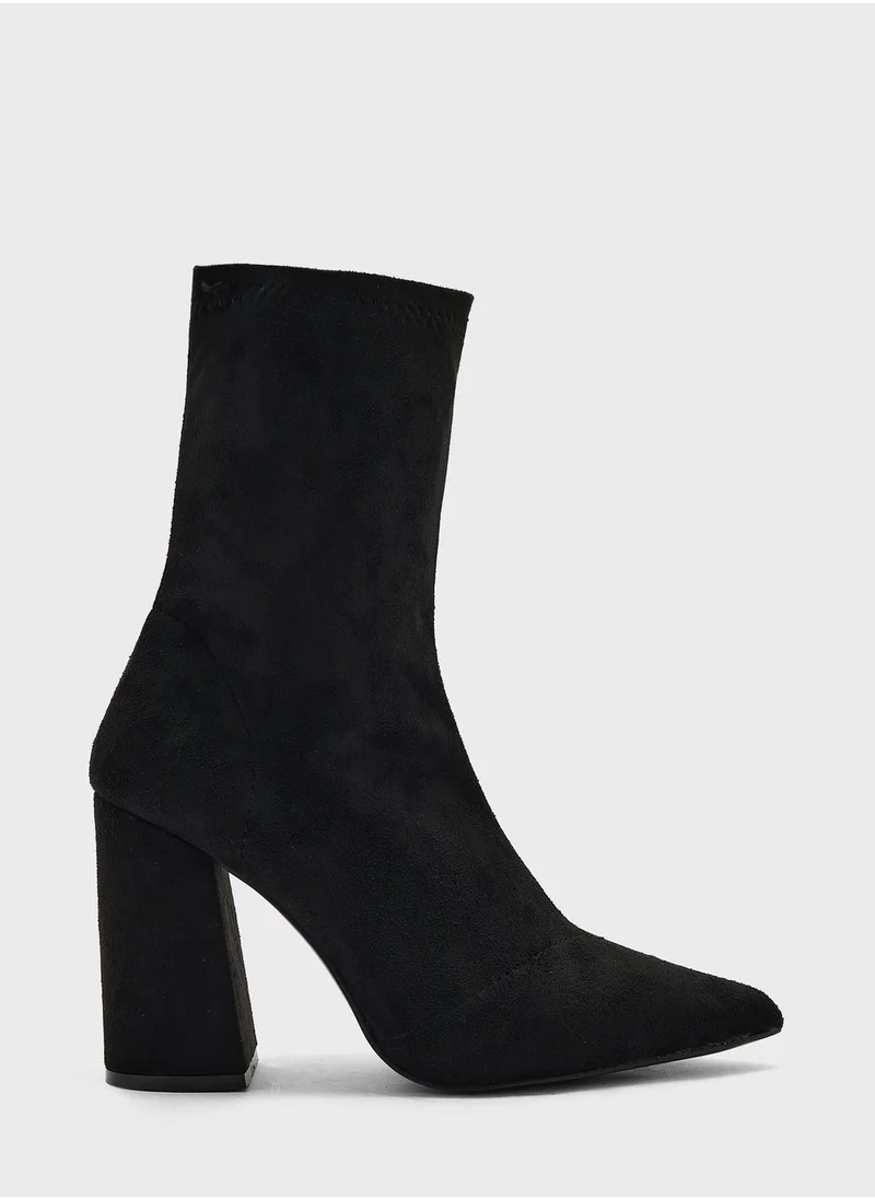 ترافل من نمشي Pointed Block Heel Sock Boot