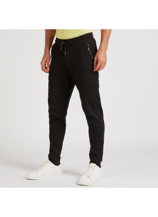 Iconic Solid Joggers with Drawstring Closure and Pockets - pzsku/ZAB2A106552877E9BBD38Z/45/_/1732382307/b4f5e9fe-f8f4-40c2-be4f-e73a0a10eb26