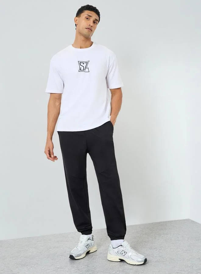 Styli Men Oversized Embroidered Crew Neck T-Shirt