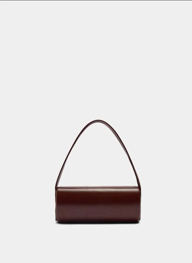 Cylindrical evening clutch