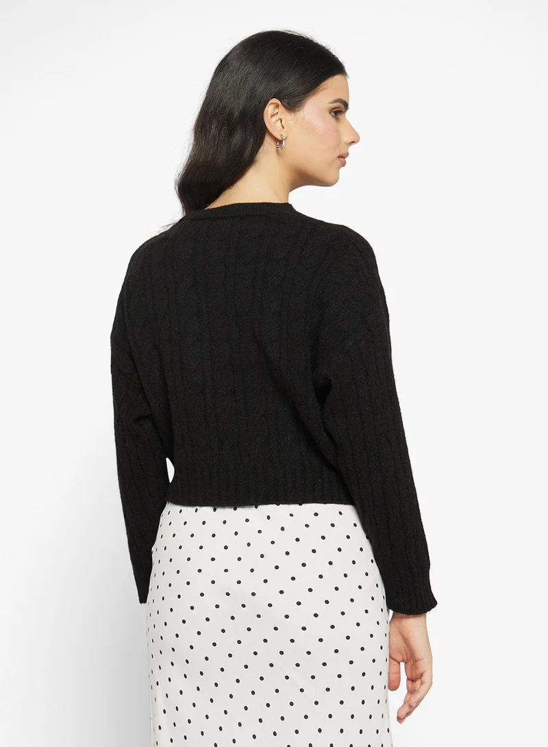 جينجر كنزة صوف محبوكة بأسلوب الكابل السميك