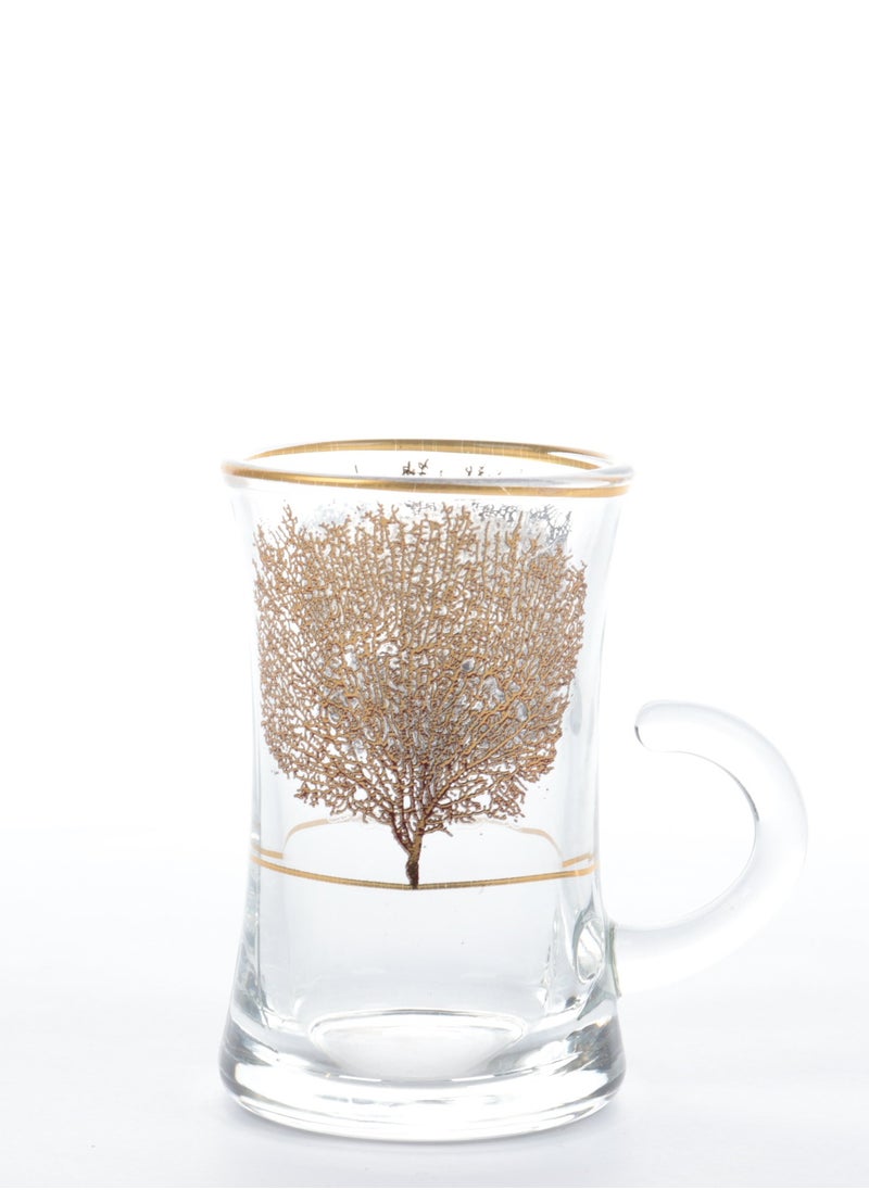 A set of glass and ceramic tea cups and coffee cups with luxurious golden leaf patterns - a luxurious design for a distinctive taste