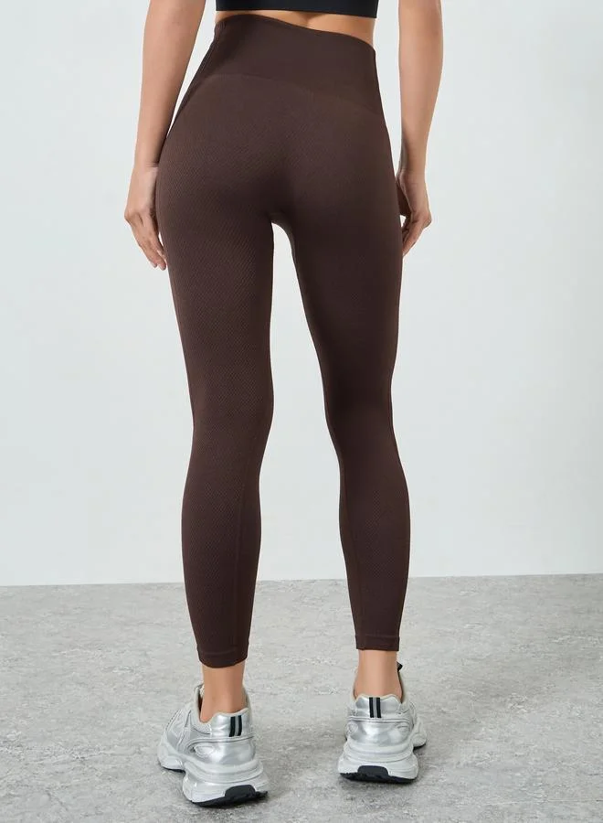 Styli Active brown Brown Textured Rib Detail Broad Waistband Leggings for Women | Best Price UAE