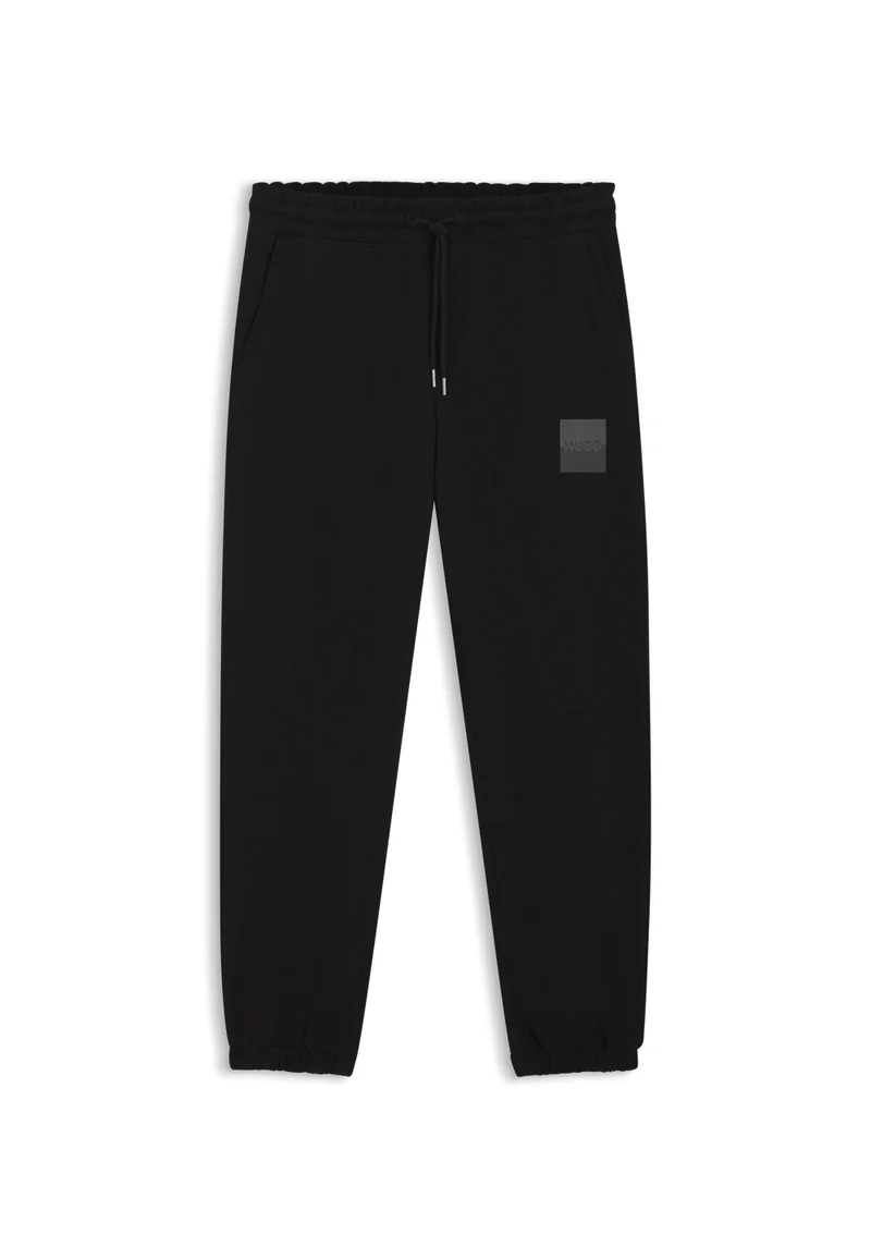 HUGO Cotton-terry tracksuit bottoms with split logo